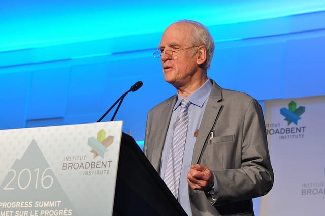 Professor Charles Taylor speaking at a podium as a keynote speaker for the Broadbent Institute's 2016 Progress Summit.
